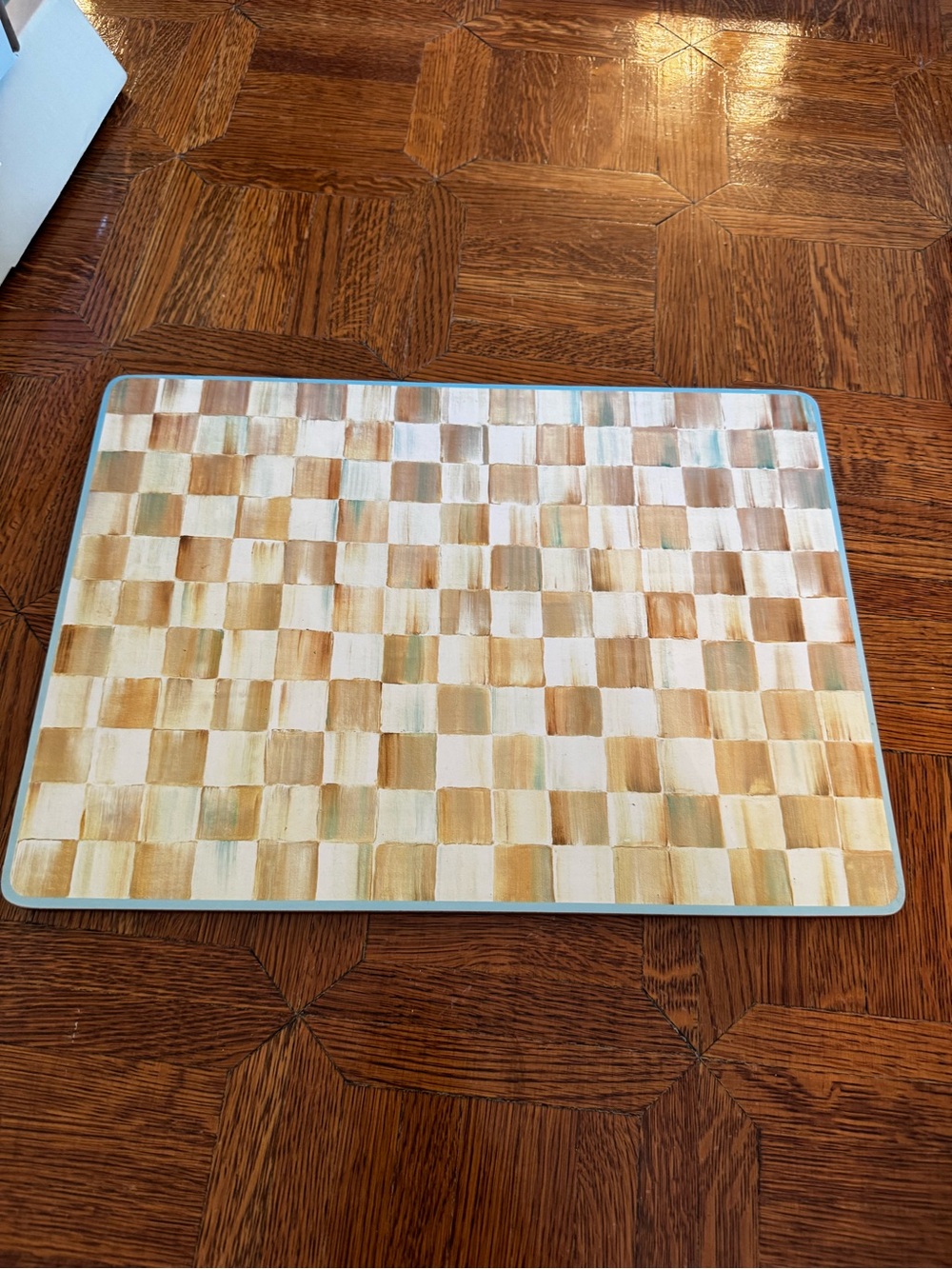 Mackenzie Childs place mats in white and yellow Checkered Design. Set of 7